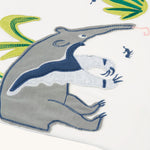 A closer look at the anteater applique on the Frugi Alfie Raglan Top - Navy Blue/Anteater