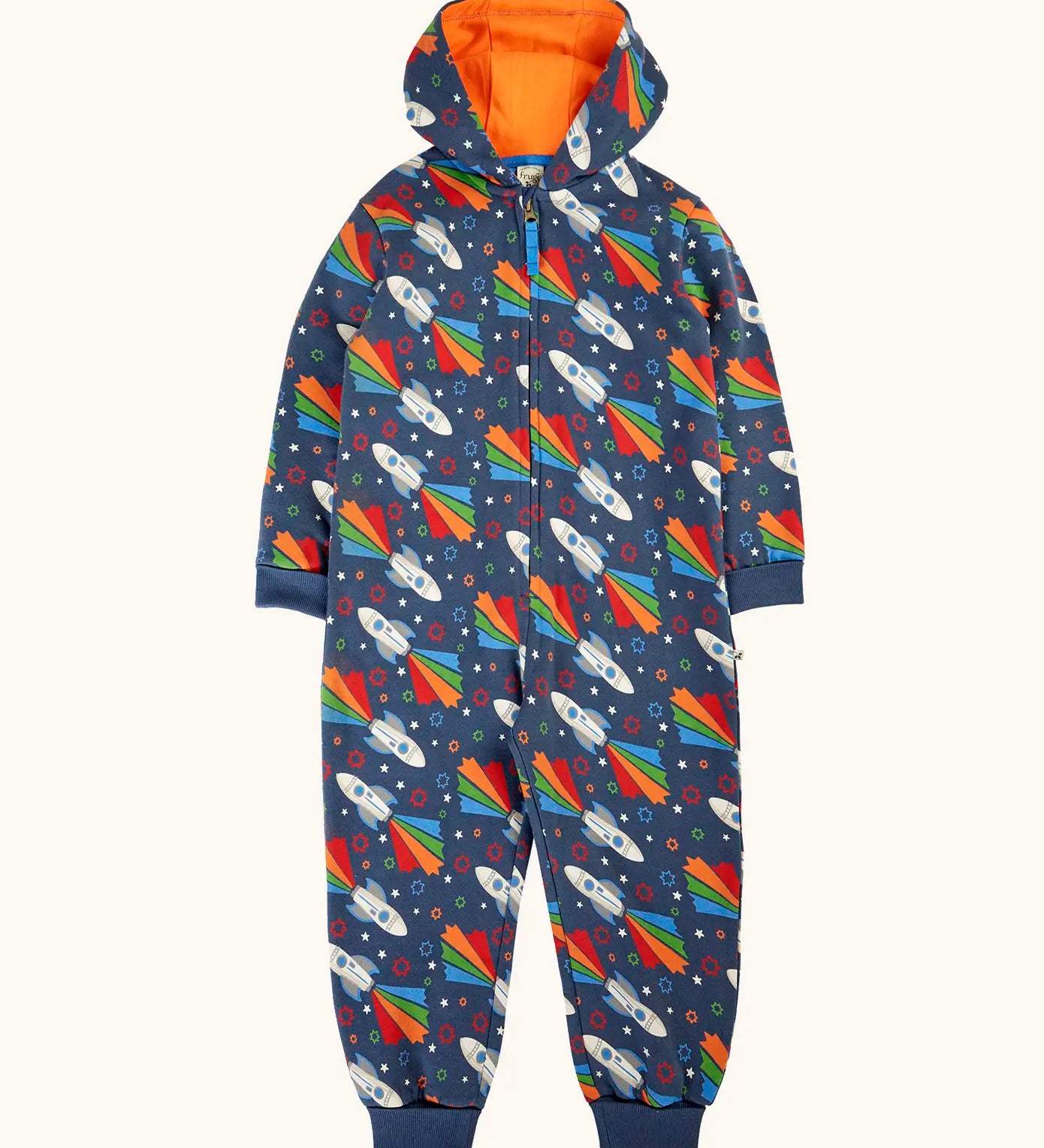 Frugi GOTS 100% organic cotton all in one hooded snuggle suit in navy with repeating playful flying rockets, full front zip and turned up cuffs