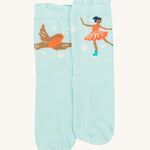 A closer look at the blue pair of socks in the Frugi Frill Socks 2 Pack- Enchanted Forest. One sock has an ice skating fairy, the other has a flying robin red breast bird