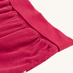 A closer look at the waistband and cord detail of the Frugi Carrot Cord Pull Ups - Lingonberry