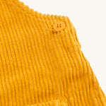 A closer look at the button for the adjustable shoulder straps