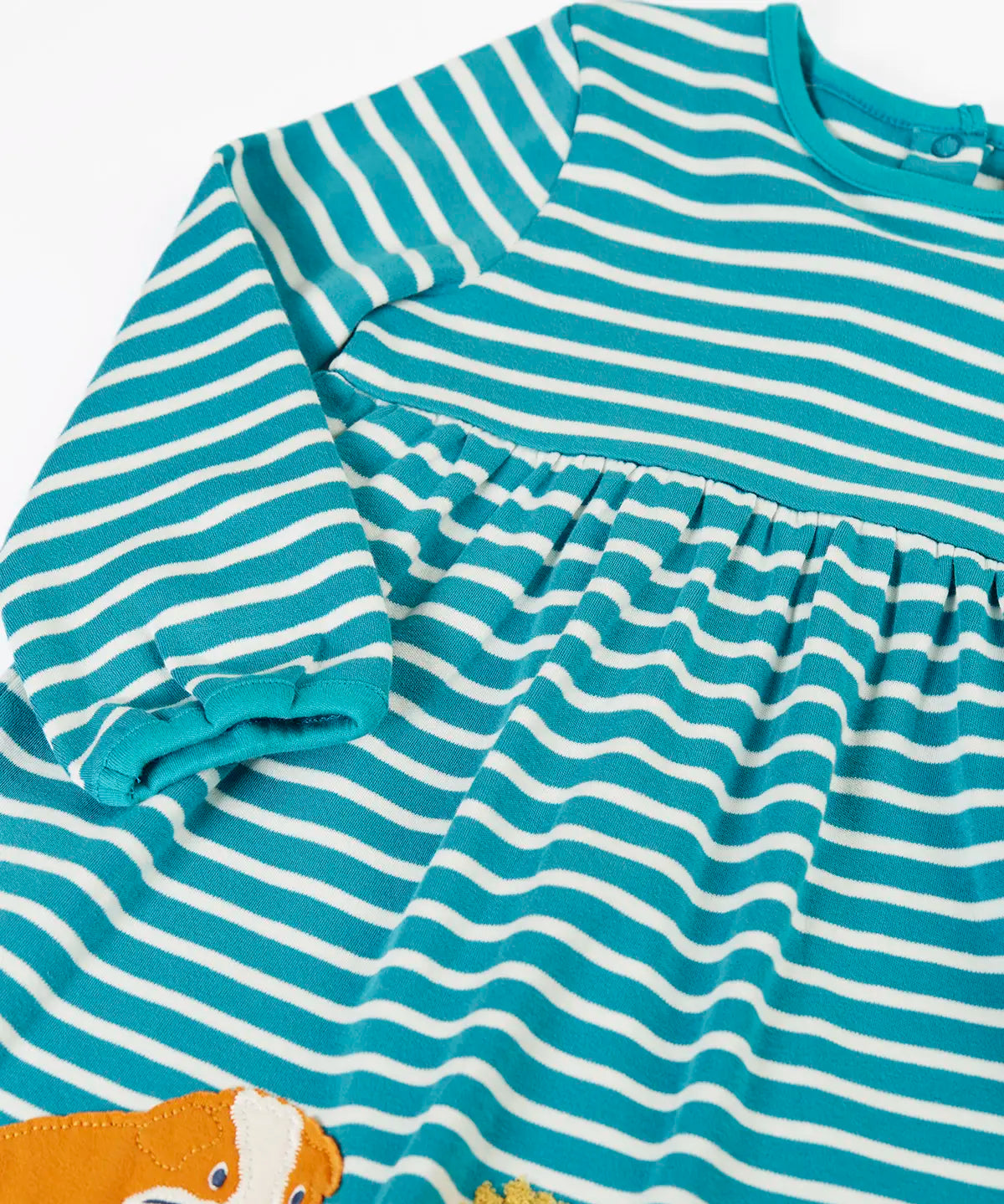 Frugi 100% GOTS organic cotton light blue and white striped kids dress laid flat showing a close up of the elasticated cuff detail 