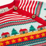 A closer look at the Christmas tree, house and star print on the Frugi Lumi Knitted Romper - Fairisle Christmas Stripe. Also shown are the buttons for easy on and off changing