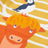 Frugi kids easy on top showing close up of a highland cow applique on yellow and white striped organic cotton fabric