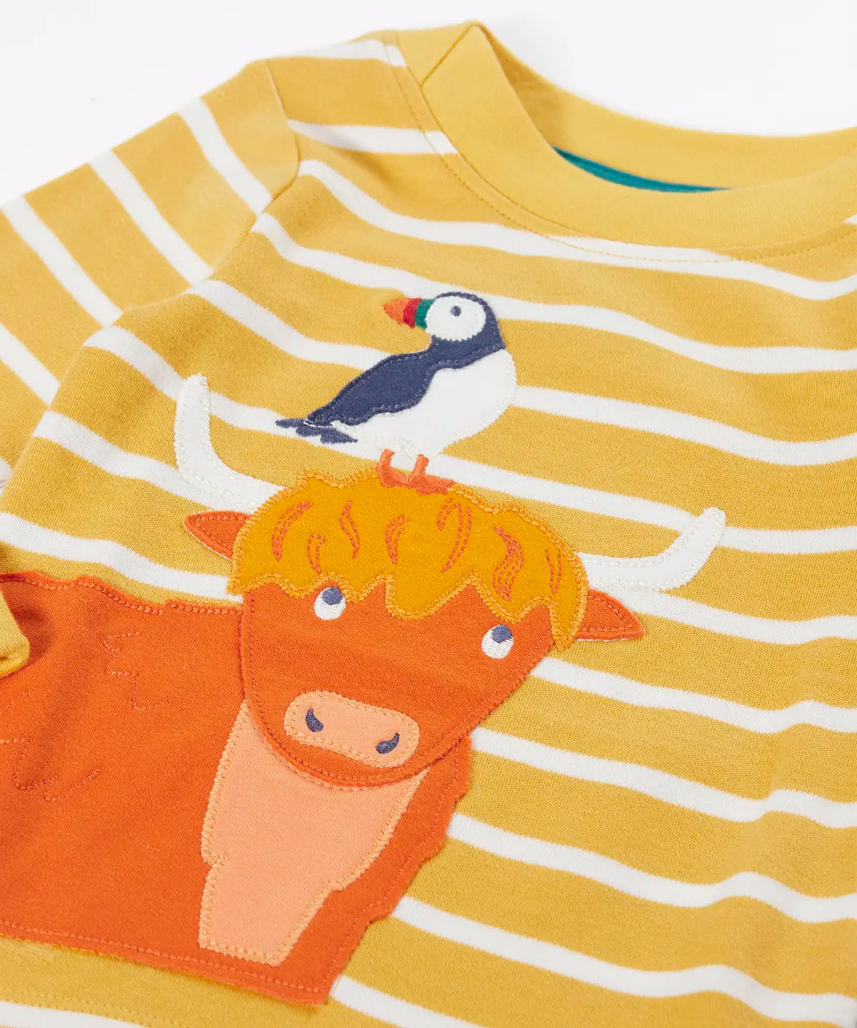 Frugi easy on top in yellow Bretton stripes with applique puffin and Highland cow.