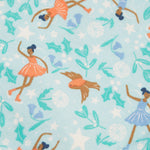 The print of the Frugi Easy Dressing Printed Babygrow - Enchanted Forest consists of flying robins, ice skating fairies, plants and flowers, on a light blue fabric