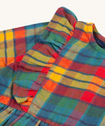 The frill detailing on the Frugi Agnes Dress - Merry Rainbow Check