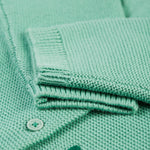 A closer look at the sleeves and cuffs on the Frugi Colby Cardigan - Moss/Giraffe