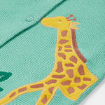 A closer look at the giraffe applique on the Frugi Colby Cardigan - Moss/Giraffe