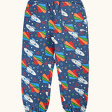Frugi GOTS 100% organic cotton navy joggers with repeating space adventure rocket print with elasticated cuffs and waist band and side pockets