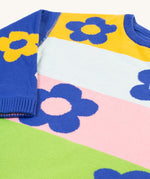 A closer look at the colour-block print on the Frugi Zola Reversible Knitted Dress - Blue Tang/Retro Floral
