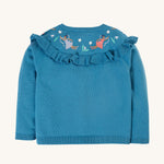 The back of the Frugi Romi Ruffle Cardigan - Deep Water/Fairies, showing the embroidered fairy's on the back of the ruffle collar