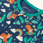 A closer look at the zipper and print on the Frugi Zelah Zip Up All In One - Roarsome!