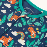 A closer look at the zipper and print on the Frugi Zelah Zip Up All In One - Roarsome!