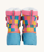 A close up of the Frugi out and about snow boots in rainbow check showing the pink trim and deep blue sole detail