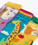 Frugi GOTS 100% organic cotton 3 pack socks including guinea pigs, giraffes, and koalas themes showing their comfy ribbed cuffs 