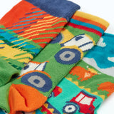 Frugi GOTS 100% organic cotton 3 pack socks including tartan, tractor and Scottish farm themes showing their comfy ribbed cuffs 