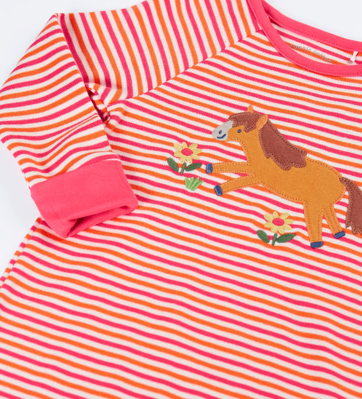 Frugi GOTS 100% organic cotton kids romper in pink and white stripes showing a close up of the horse applique on the front chest