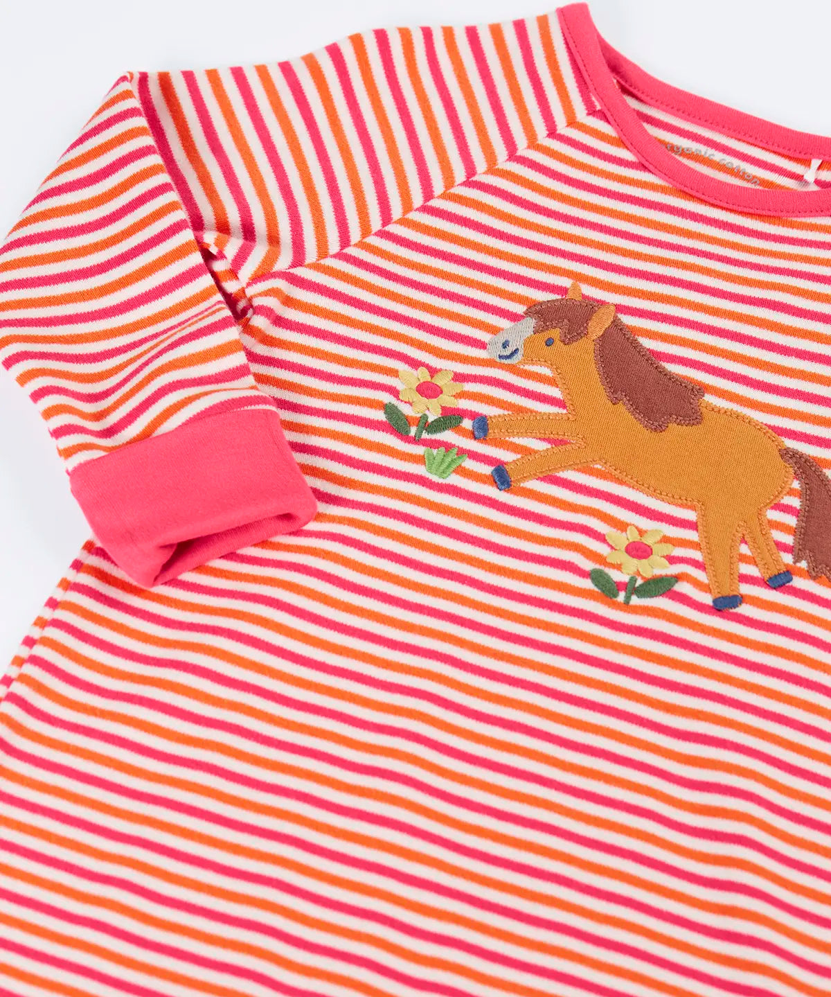 Frugi GOTS 100% organic cotton kids romper in pink and white stripes showing a close up of the horse applique on the front chest