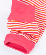 Frugi GOTS 100% organic cotton kids romper in pink and white stripes showing a close up of the fold up cuffs for extender wear