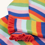 A closer look at the lovely ruffled wrist cuffs on the Frugi Zoe Knitted Jumper - Retro Stripe. The image also shows the bright and bold colour-block fabric