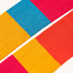 A closer look at the colours on the Frugi Norah Tights - Deep Water Colour Block
