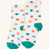The white with polka dot print socks from the Frugi Rock My Socks - Stay Wild 3 Pack