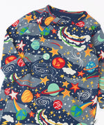 Frugi navy kimono style babygrow with a repeating playful outer space print showing the full front zip detail on navy organic cotton fabric