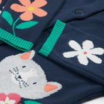 A closer look at the flower and cat detail on the body and sleeves of the Frugi Reva Knitted Cardigan - Navy Blue/Cat