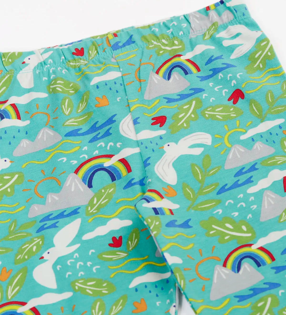 Frugi happy hikes Laurie shorts in aqua laid flat showing repeating seagull and mountain design and elasticated waist band