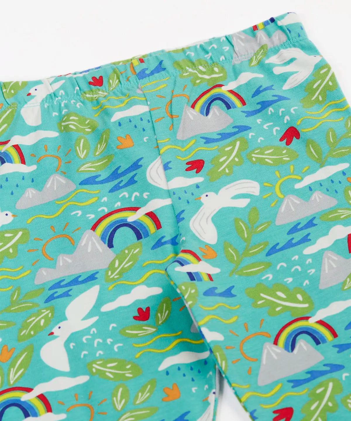 Frugi happy hikes Laurie shorts in aqua laid flat showing repeating seagull and mountain design and elasticated waist band