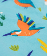 A close up of the flying kingfisher design on the Frugi libby leggings in kingfisher skies available at Babipur. 