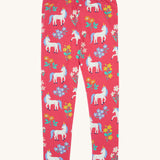 Frugi libby leggings in rose unicorn/floral available at Babipur. A GOTS organic cotton legging in pink with a white unicorn and floral design.