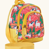 Side of Frugi Shetland skip little adventures backpack. Showing a handy rein attached to the handle and yellow zip details