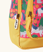 Frugi Shetland skip little adventures backpack showing a close up of the repeating Shetland pony, trees and cat design and yellow zip detail