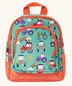 Frugi terrific tractors little adventures backpack. A light green backpack with orange trim and a repeating tractor design. Features 2 compartments