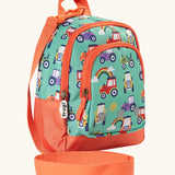 Side of Frugi terrific tractors little adventures backpack. Showing a handy rein attached to the handle and orange zip details