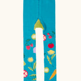 Frugi GOTS 100% organic cotton knitted leggings in light blue with mixed vegetable design on the legs and green frill on the cuffs