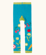 Frugi GOTS 100% organic cotton knitted leggings in light blue with mixed vegetable design on the legs and green frill on the cuffs