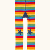 Front of Frugi's GOTS 100% organic cotton knitted leggings in rainbow stripes with navy star knee patches