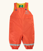 Frugi little waterproof dungarees in fire orange with yellow fleece inner. Features popper fasteners, elasticated cuffs and reflective strips on the lower legs