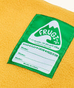 Frugi little waterproof dungarees showing yellow fleece inner and name tag