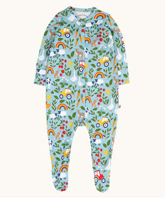 Frugi organic cotton footed babygrow. In light blue with a repeating farm themed print and a popper fastener from the neckline down the legs.