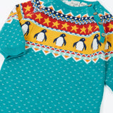 Frugi organic cotton knitted rompersuit in light blue with a winter themed fairisle design on the upper half. Features elasticated cuffs for easy dressing