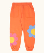 Frugi GOTS 100% organic cotton salamander orange organic joggers with flower appliques on the lower leg and side pockets