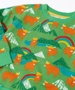 Frugi GOTS organic cotton kids-sweatshirt in green with a repeating highland cow and mountain print with a ribbed neck line
