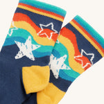 A closer look at the navy rainbow star print socks, from the Frugi Little Socks - Stars 2 Pack