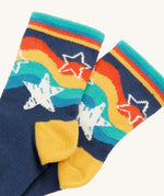 A closer look at the navy rainbow star print socks, from the Frugi Little Socks - Stars 2 Pack