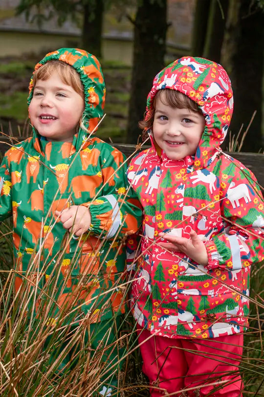 Frugi Puddle Buster Caots in pink purrfect ponies and green highland cow grazing, to represent Frugi back to school at Babipur.
