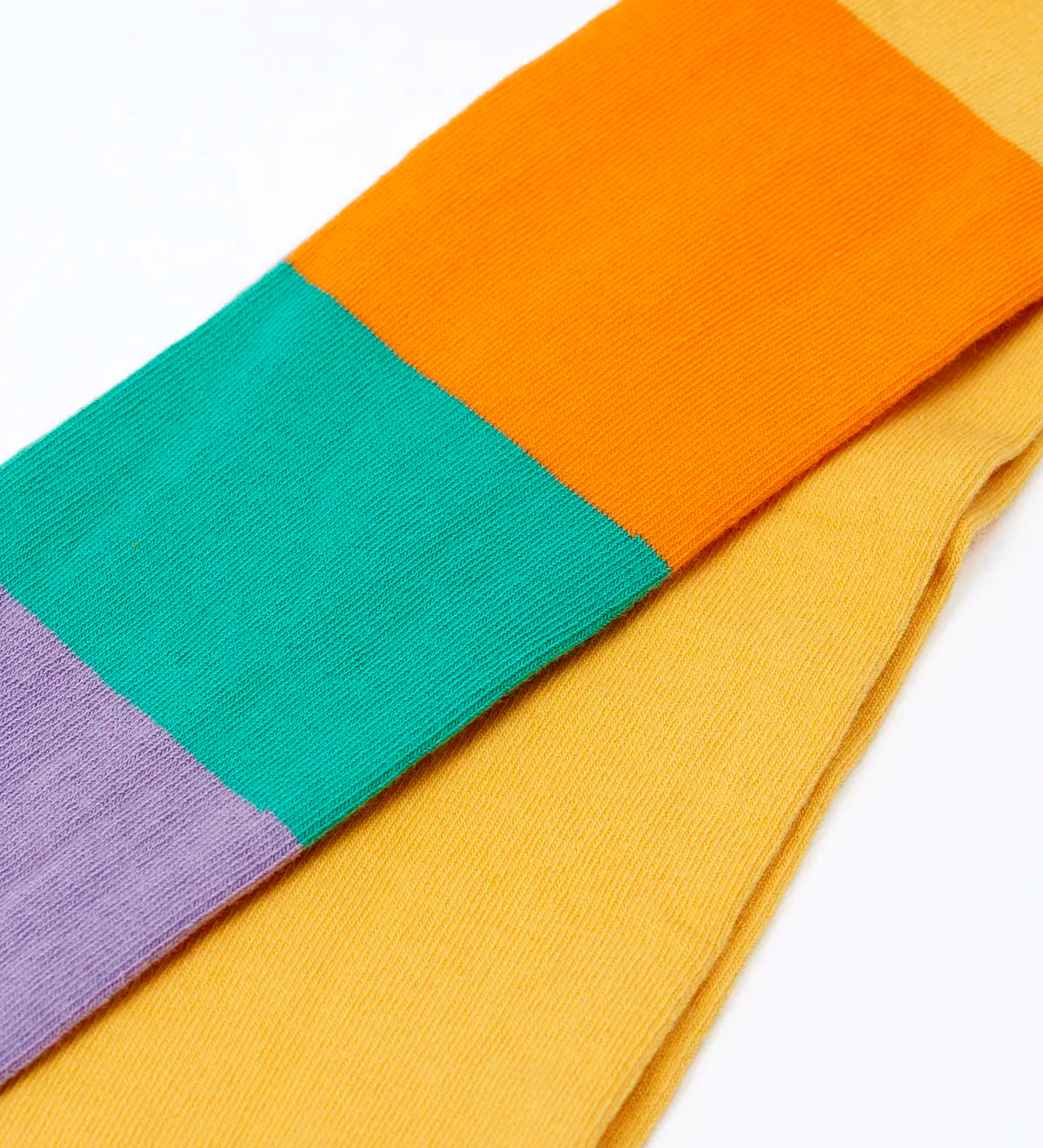 Frugi GOTS 100% organic cotton 2 pack tights showing a close up of the pastel rainbow striped design